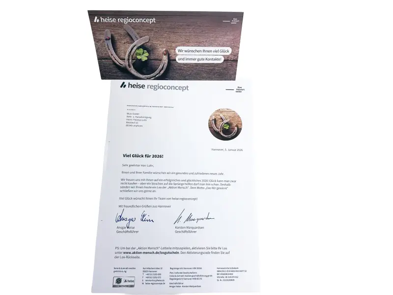 Schriftlicher Neujahrsgruß von heise regioconcept mit Losgutschein für die "Aktion Mensch"